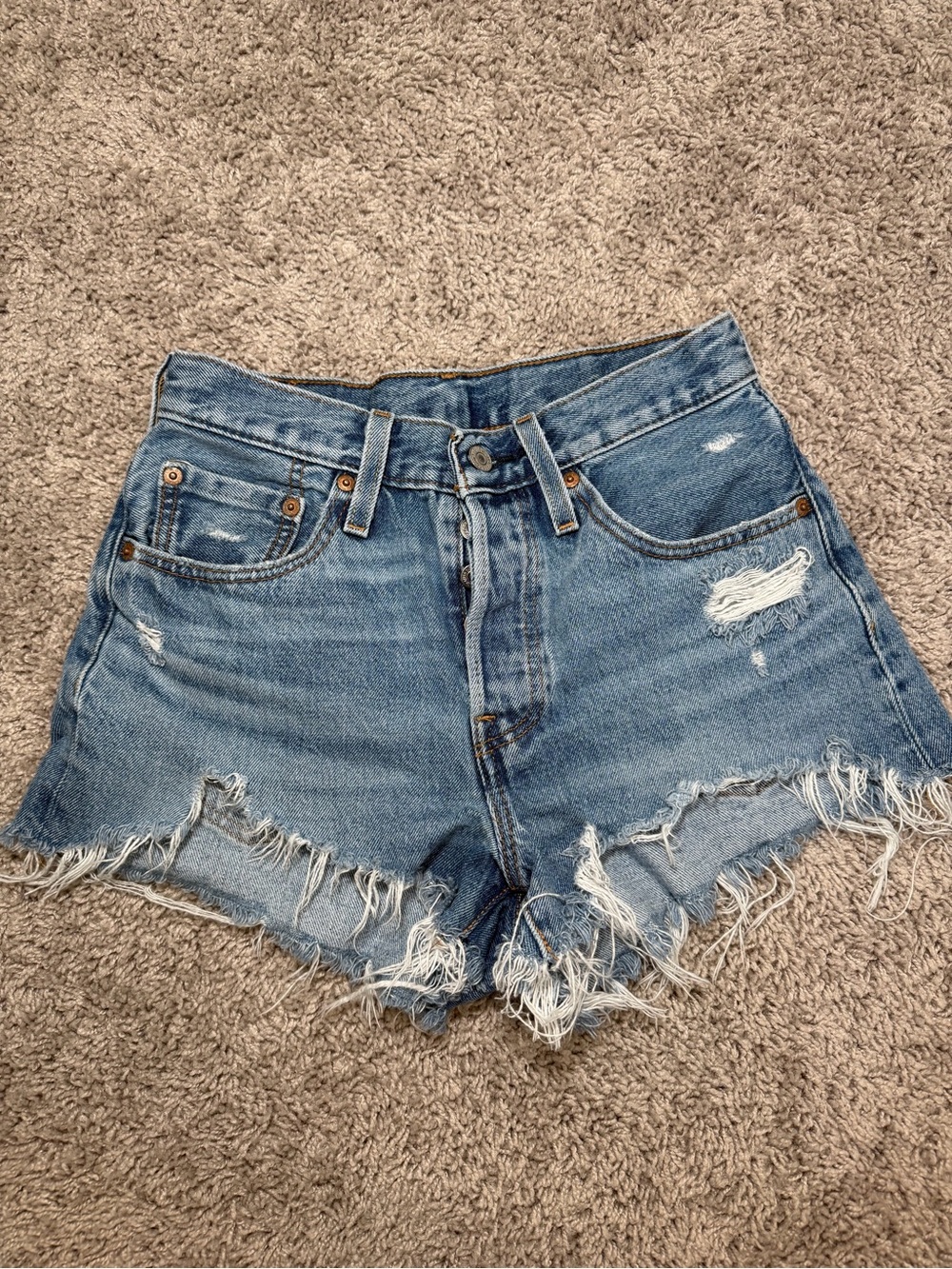 Levi's High-Rise Distressed Light Blue Shorts